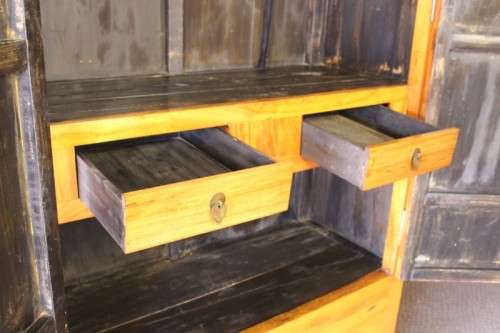 A beautiful & stunningly carved Oriental Elm wood double door cabinet w/ tradition handles & hinges