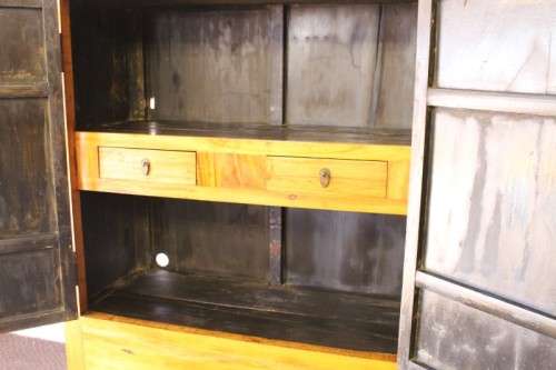 A beautiful & stunningly carved Oriental Elm wood double door cabinet w/ tradition handles & hinges