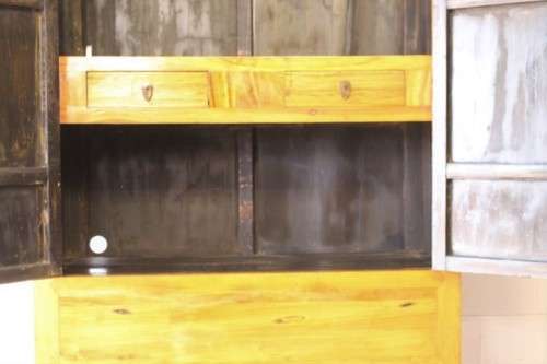 A beautiful & stunningly carved Oriental Elm wood double door cabinet w/ tradition handles & hinges