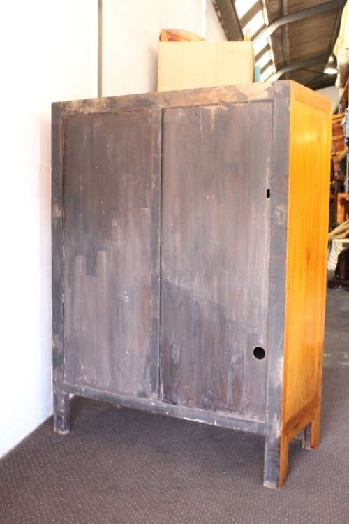 A beautiful & stunningly carved Oriental Elm wood double door cabinet w/ tradition handles & hinges