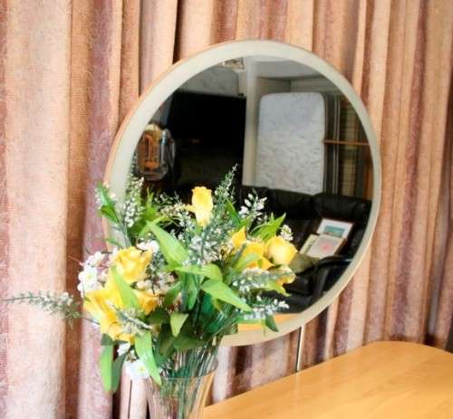 **RS17** A modern styled dressing table with 4 large drawers, side cupboards and an oval mirror