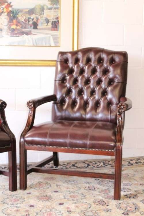 A magnificent large PU leather Gainsborough armchair w/ carved detailed armrests - 2x Available
