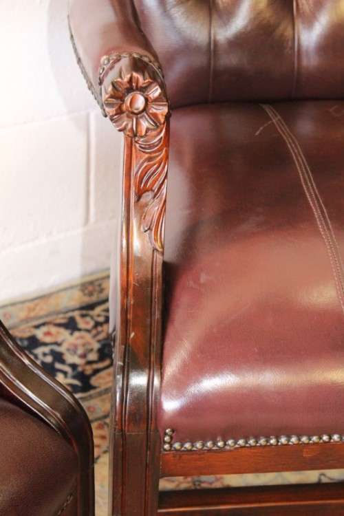 A magnificent large PU leather Gainsborough armchair w/ carved detailed armrests - 2x Available