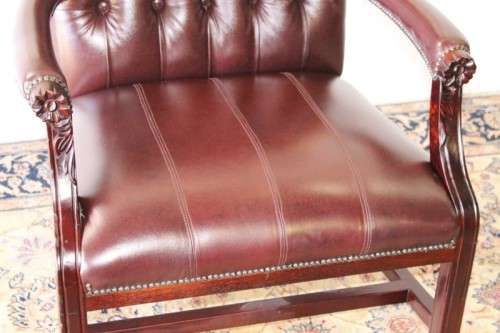 A magnificent large PU leather Gainsborough armchair w/ carved detailed armrests - 2x Available
