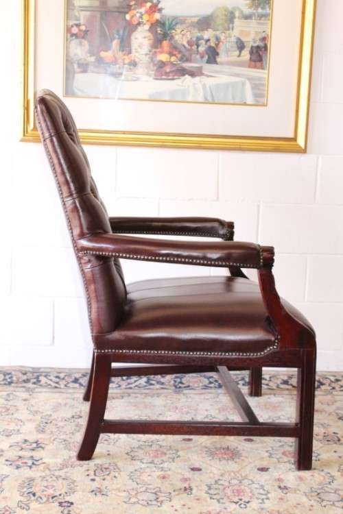A magnificent large PU leather Gainsborough armchair w/ carved detailed armrests - 2x Available