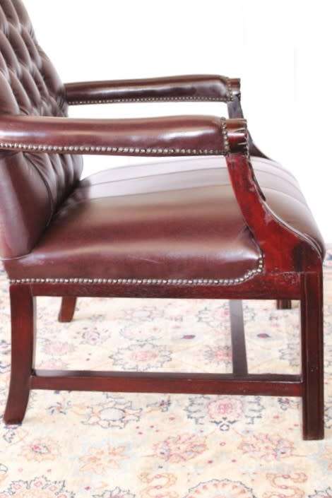 A magnificent large PU leather Gainsborough armchair w/ carved detailed armrests - 2x Available