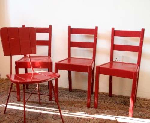 Four painted red wooden occasional chairs, stunning on a patio, porch etc. price/ chair