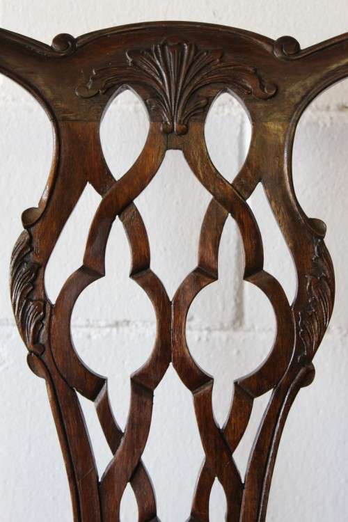 A superb set of eight vintage Stinkwood carved & upholstered ball and claw chairs incl. two carvers