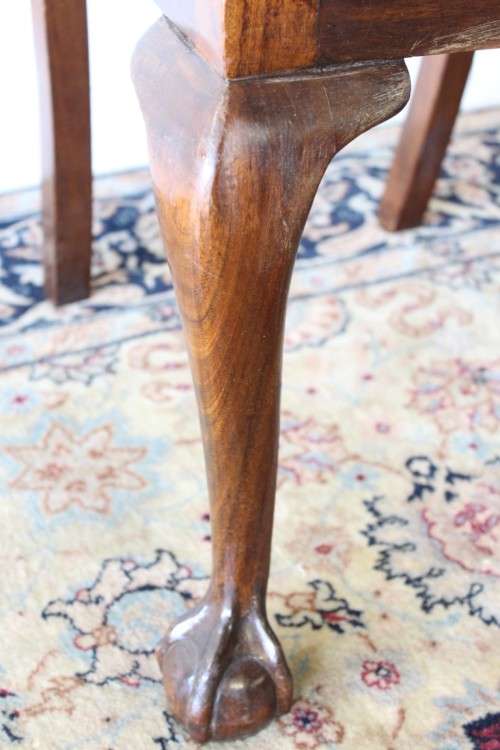 A superb set of eight vintage Stinkwood carved & upholstered ball and claw chairs incl. two carvers