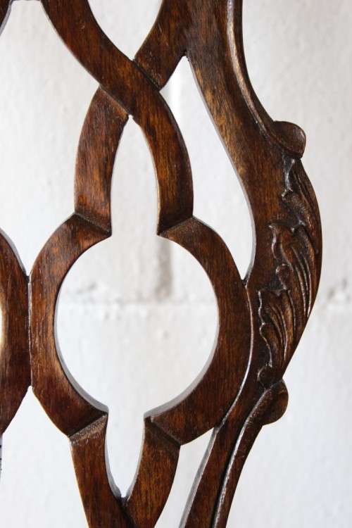 A superb set of eight vintage Stinkwood carved & upholstered ball and claw chairs incl. two carvers