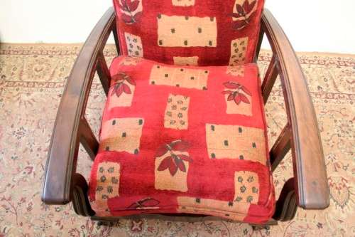 **RS17** A vintage cushioned Imbuia ball & claw arm chair, fantastic in a study, bedroom, lounge.