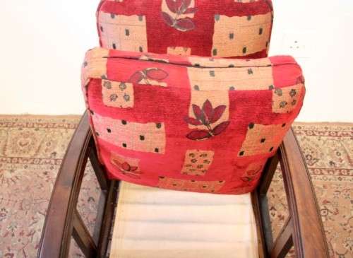 **RS17** A vintage cushioned Imbuia ball & claw arm chair, fantastic in a study, bedroom, lounge.