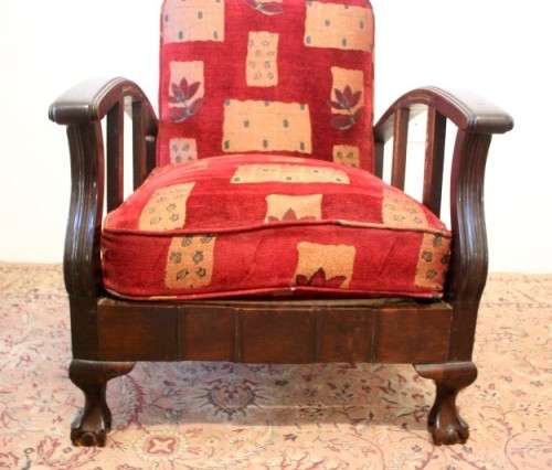 **RS17** A vintage cushioned Imbuia ball & claw arm chair, fantastic in a study, bedroom, lounge.