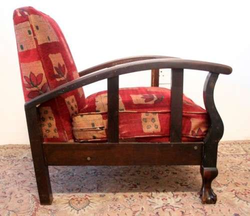 **RS17** A vintage cushioned Imbuia ball & claw arm chair, fantastic in a study, bedroom, lounge.