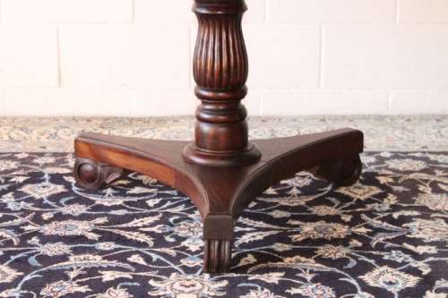 A stunning and solidly made antique Victorian round Rosewood hall/ foyer table with carved feet