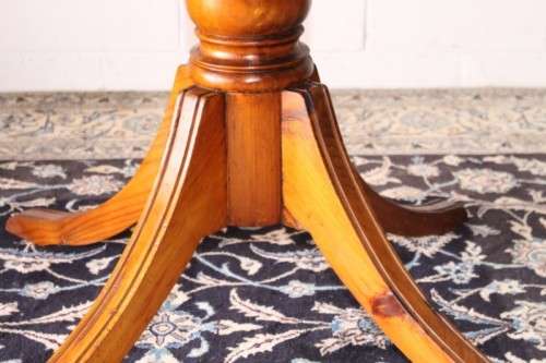 **RS17** A well made round glass-top hall/ foyer table w/ solid turned pedestal leg & broad fascia