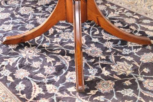 **RS17** A well made round glass-top hall/ foyer table w/ solid turned pedestal leg & broad fascia