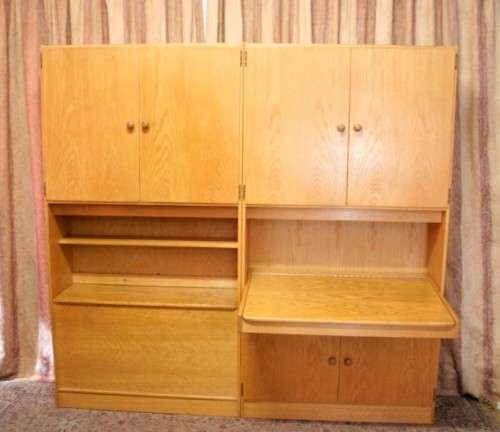 **RS17** A beautifully made wall unit/ cabinet with loads of cupboards and a lift top writing desk.