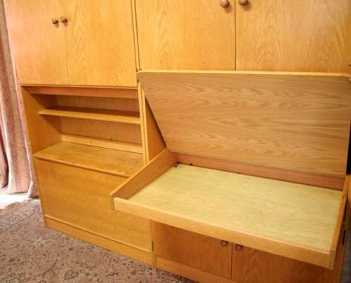 **RS17** A beautifully made wall unit/ cabinet with loads of cupboards and a lift top writing desk.