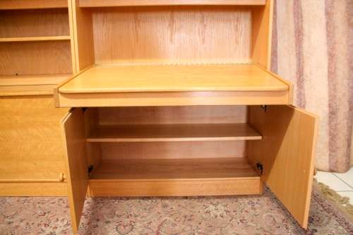 **RS17** A beautifully made wall unit/ cabinet with loads of cupboards and a lift top writing desk.