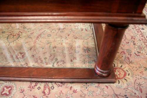 A fabulous, large glass top and bottom Mahogany coffee table with straight clean lines