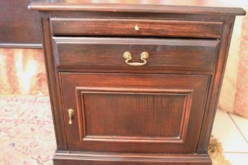 A fabulous Mahogany (168cm) queen size headboard and two pedestals with drawers and cupboards.