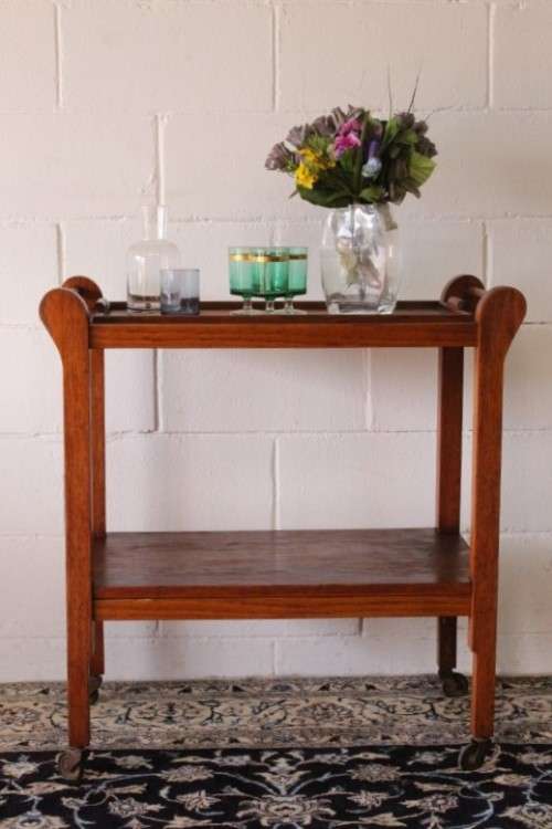 **RS17** A wonderful solid oak 2-tier tea/ drinks trolley w/ removable tray on its original castors