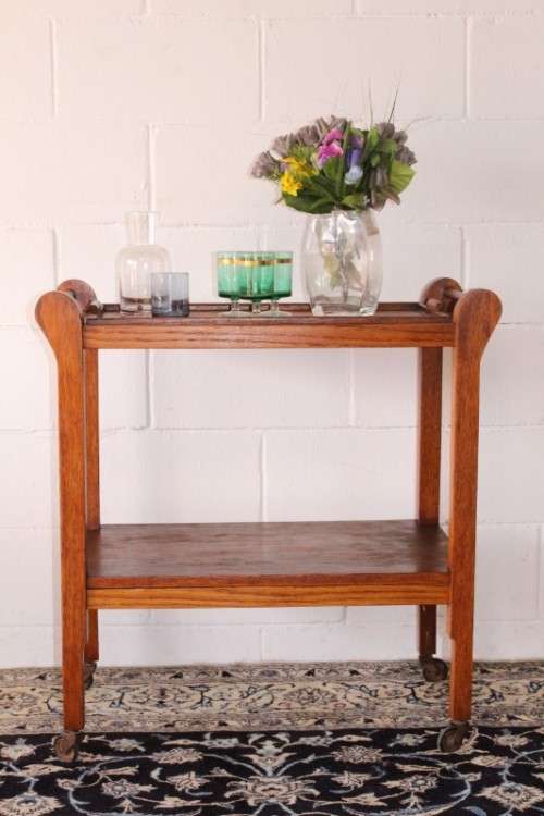 **RS17** A wonderful solid oak 2-tier tea/ drinks trolley w/ removable tray on its original castors