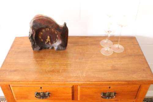 **RS17** An antique four-drawer (2-over-2) yellow wood chest of drawers w/ metal Art Nouveau handles