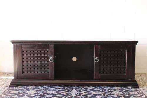A dark-brown stained 1.7m long double door entertainment/ TV unit with ample space for components