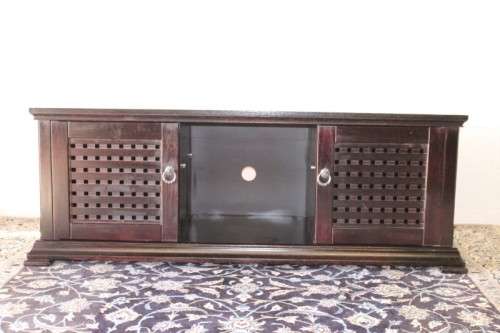 A dark-brown stained 1.7m long double door entertainment/ TV unit with ample space for components