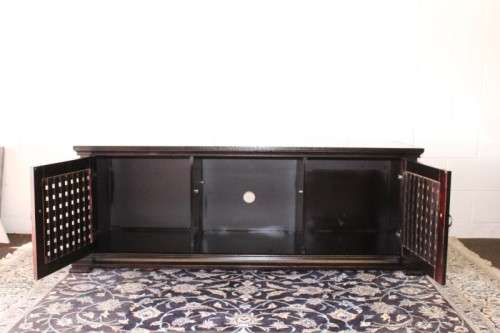 A dark-brown stained 1.7m long double door entertainment/ TV unit with ample space for components