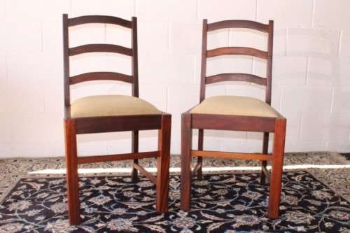 **RS17** Two solidly made vintage/ antique? solid teak occasional chairs in a sand colour fabric