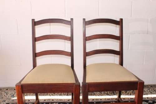 **RS17** Two solidly made vintage/ antique? solid teak occasional chairs in a sand colour fabric