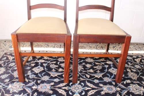 **RS17** Two solidly made vintage/ antique? solid teak occasional chairs in a sand colour fabric