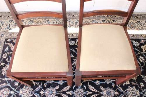 **RS17** Two solidly made vintage/ antique? solid teak occasional chairs in a sand colour fabric