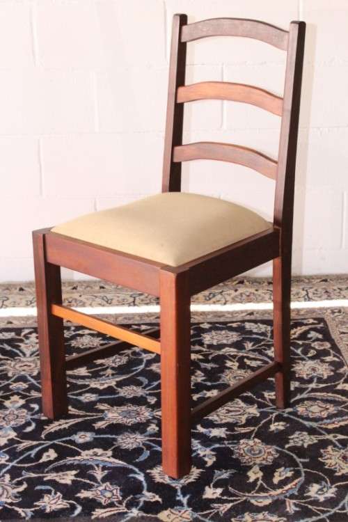 **RS17** Two solidly made vintage/ antique? solid teak occasional chairs in a sand colour fabric