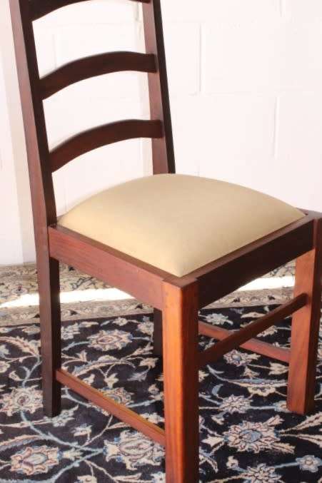 **RS17** Two solidly made vintage/ antique? solid teak occasional chairs in a sand colour fabric