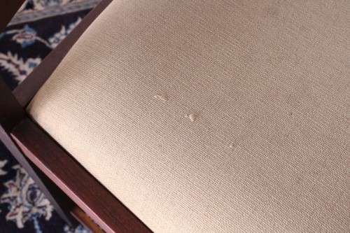 **RS17** Two solidly made vintage/ antique? solid teak occasional chairs in a sand colour fabric