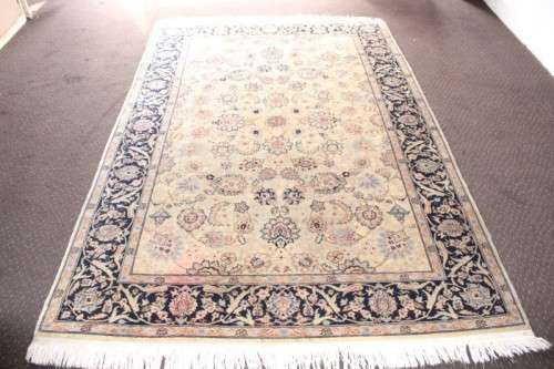 A wonderful large 275cm x 184cm Romanian Balkin Muras (persian) carpet with a Kashan design