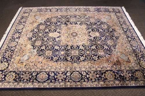 **RS17** An intricately detailed & longer pile original Iranian Kashan Persian carpet; 250cm x 202cm