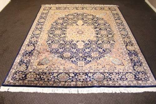 **RS17** An intricately detailed & longer pile original Iranian Kashan Persian carpet; 250cm x 202cm