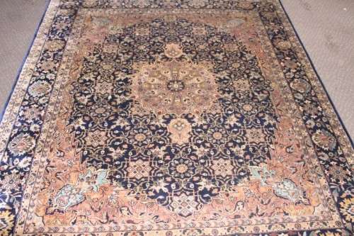 **RS17** An intricately detailed & longer pile original Iranian Kashan Persian carpet; 250cm x 202cm