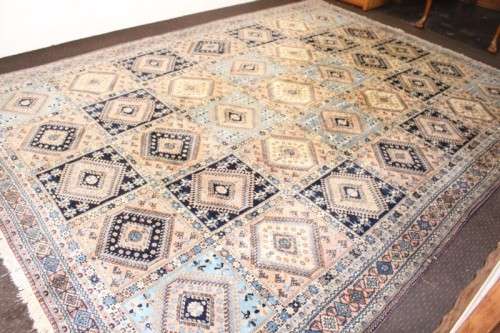 A magnificent & intricately detailed X-large (410cm x 298cm) Persian carpet with a diamond design