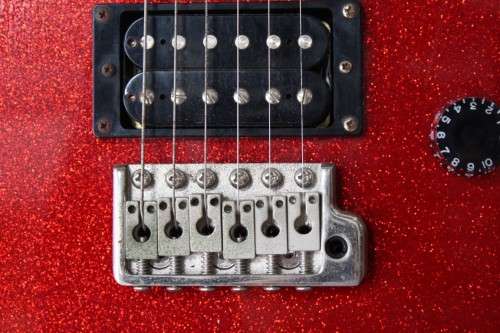A awesome PRS SE Orianthi signature "red sparkle" electric guitar in good condition w/ carry bag!