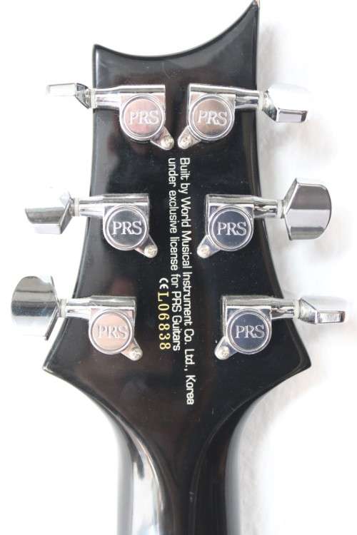 A awesome PRS SE Orianthi signature "red sparkle" electric guitar in good condition w/ carry bag!