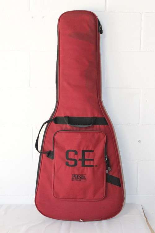A awesome PRS SE Orianthi signature "red sparkle" electric guitar in good condition w/ carry bag!