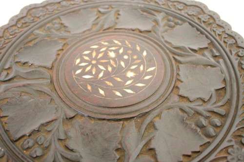 **RS17** A carved round Indian wood occasional/ side table with inlay detail and a hexagon base.