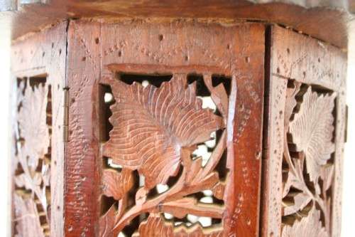 **RS17** A carved round Indian wood occasional/ side table with inlay detail and a hexagon base.