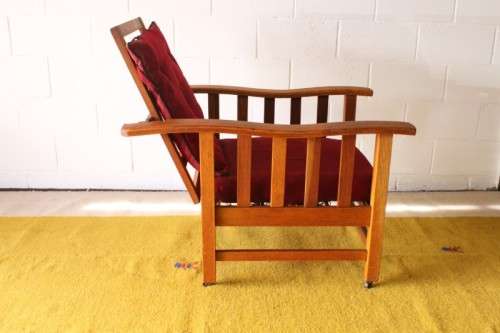 **RS17** Wonderful vintage solid oak Morris chair on castors w/ upholstered cushions in red fabric